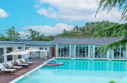 Luguhu Mukeqingsu Designer Boutique Resort Homestay - Bar