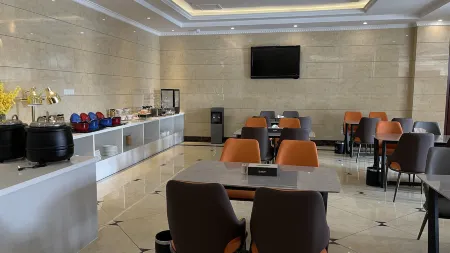 Jinyi Hotel (Zhenhua Commercial Building High-speed Railway Station) Отели рядом с достопримечательностью «Huangcheng Ancient City»