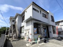 Kikai Island Rakuraku Stay “Room 201” – Retro island life in a tropical nostalgic apartment.