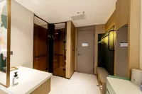 Jingbian Qiuguo Hotel Отели рядом с достопримечательностью «Tongwancheng Archaeological Site Park»