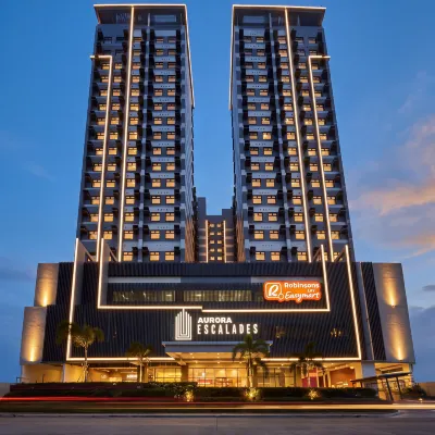 Home Me Suites at Aurora Escalades Cubao/Near LRT-2 โรงแรมใกล้สถานีรถไฟฟ้าใต้ดินกามูนิง