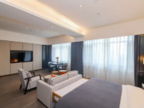 โรงแรมอี วอเตอร์ ซอร์ส (พลาซ่าบาวหลง สถานีรถไฟความเร็วสูงหลงเหมิน ลั่วหยาง) โรงแรมในลั่วหยาง