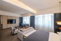 Yi Water Source Hotel (Luoyang Longmen High-speed Railway Station Baolong Plaza)