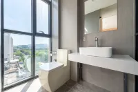 Qiaoyi Hotel (Longhu Taishan Road Branch) - خدمة نقل من وإلى المطار