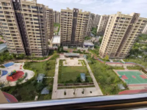 暖嘉旅舍（大季家高鐵站蓬萊機場店） 煙台蓬萊國際機場附近的飯店