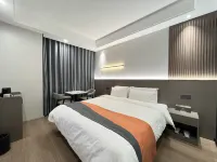 Leshan Mingxian Hotel Отели рядом с достопримечательностью «Leshan Radio and Television University Wutongqiao Chuanyanhua TV University Branch»