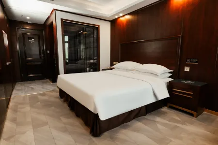 Huating·Aofeng Hotel (Pingyang Railway Station Yintai City Branch)