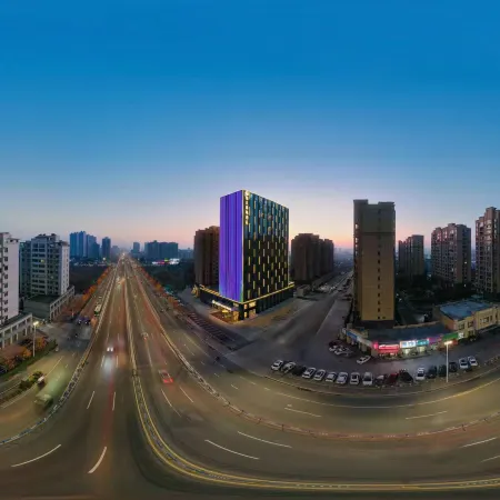 Jinjiang Metropolo Hotel (Xinyang Railway Station Xiya City)