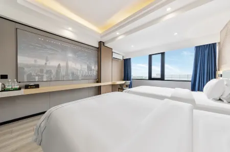 Migao Hotel (Wanning Municipal Government High Speed Railway Station) Отели рядом со станцией Wanning Railway Station