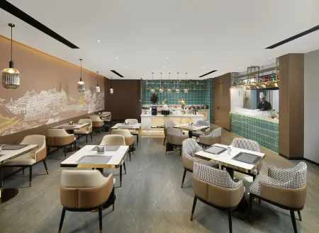 MEHOOD EZZI Hotel (Jiexiu Shi Beitanzhong Road Railway Station) Отели в г. Цзесю