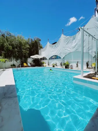 CASA V. Отели рядом с достопримечательностью «Beizaijiao Beach»