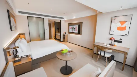 Shankee Coffee Style Hotel (Aksu Railway Station) Отели рядом с достопримечательностью «Jingong Folk Custom Garden»