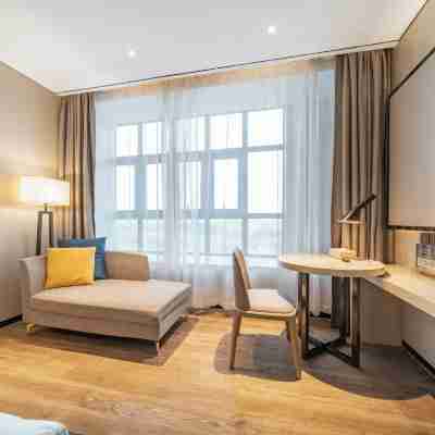 Yishang Hotel (Zhoukou High speed Railway East Station Huayao City Branch) Rooms