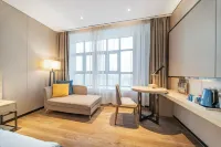 Yishang Hotel (Zhoukou High speed Railway East Station Huayao City Branch) فنادق في جَوكَو