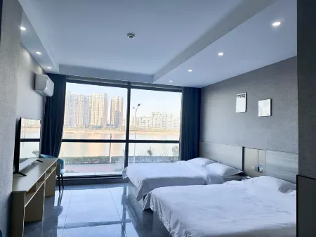 Shierzeshengxiao Hotel Отели в г. Гуаншань