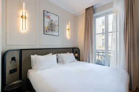 Aparthotel Adagio Paris Opéra Отели рядом с достопримечательностью «St-Medard»