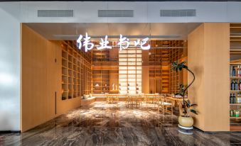 Huayue Kaixuan Grand Hotel (Weiye Building Xincheng Bus Station)
