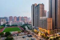 尚府軽宿ホテル（茂名高速鉄道駅東信時代広場） 茂名バスターミナル - 西区周辺のホテル