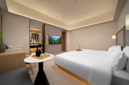 Yichun Songlinli Inn Отели в г. Ичунь