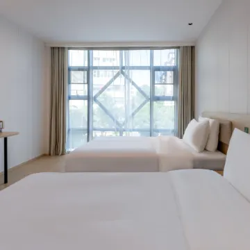Hi Inn (Fuzhou Sanfangqixiang) Отели рядом с достопримечательностью «Фуцзянский Медицинский Университет (Тайцзянский Кампанский) - библиоте»