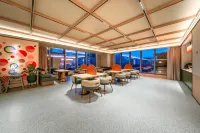 Orange Hotel (Liupanshui High-Speed Rail Station Renmin Square Branch) - พร้อมอาหารเช้า