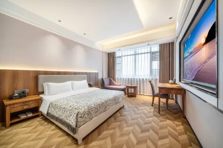 Huihe Hotel (Yingtan Railway Station South Station Road store) Отели рядом с достопримечательностью «Maple Mountain Botanical Garden»