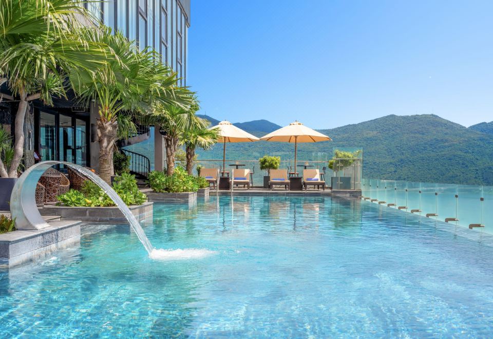 Peninsula Hotel Danang oceanfront facade and infinity pool
