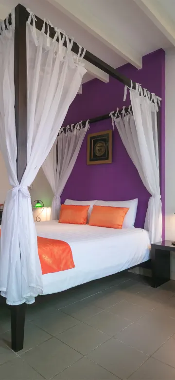 ห้องดีลักซ์พร้อมระเบียง (ปีกซิโน)