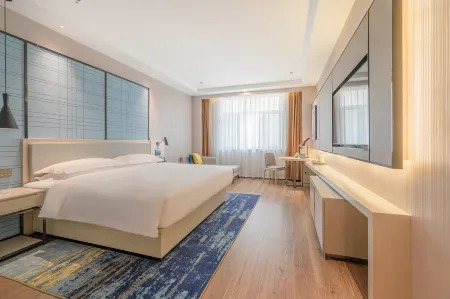 Echarm Hotel (Zhangye West Railway Station Bell Tower Area) Отели рядом с достопримечательностью «Xilaisi»