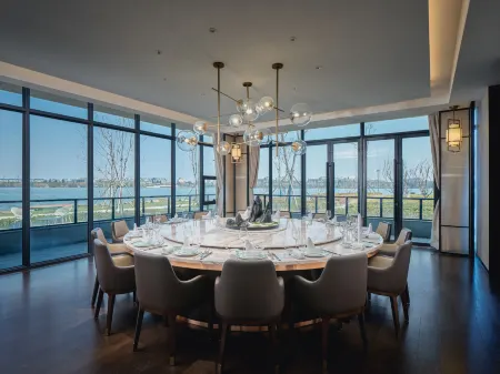 Jiaxing Greenland Primus Hotel (Xiangjiadang) Отели в г. Цзясин