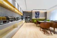 GreenTree Inn - พร้อมอาหารเช้า