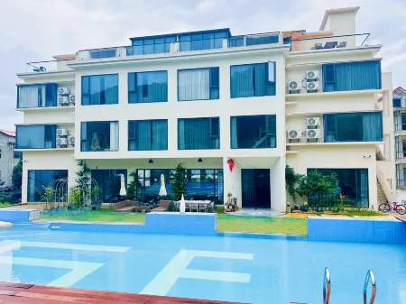 39 Garden Homestay, Lushanxihai Scenic Area Отели рядом с достопримечательностью «Zhelin Lake Peach Blossom Creek Rafting Scenic Area»