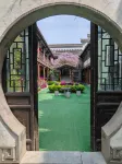 Chunmanting| Wabi-Sabi Courtyard · Travel Photography · Courtyard Canal View · Old City Chinese Inn