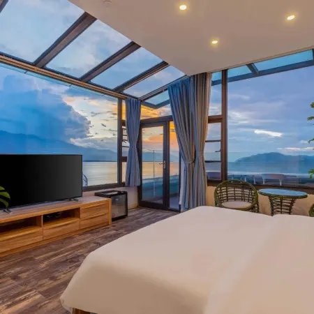 Jiatu Scenic Hotel (Dali Erhai Park Railway Station) Отели в г. Дали