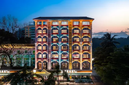 Manning Nanyang Hotel Отели рядом с достопримечательностью «Xinglong Tropical Garden»