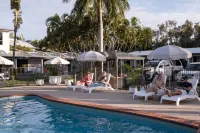 킨카 팜 비치프론트 아파트먼트 / 모텔