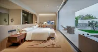 Tengchong Breeze and Courtyard Natural Hot Spring Homestay - سبا