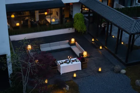 Magnolia Maison Отели рядом с достопримечательностью «Moxi Ancient Town»