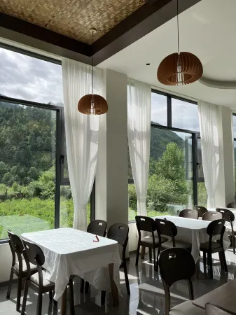 ShanHe Riverside Lodge Отели рядом с достопримечательностью «Seven-color Sea»