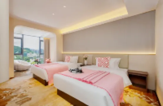 海岸酒店（西雙版納景洪告莊西雙景星光夜市店）