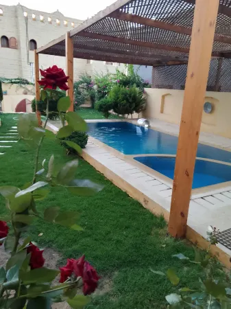 Villa Kingdom of Tunisia Отели в г. Qaroun