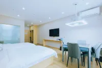 Yichang Qishenghui Hotel (Olympic Sports Center University Town) Hotell i Dianjun District