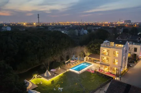 Daochi Garden Hotel Отели рядом с достопримечательностью «Shanghai Wild Animal Park»