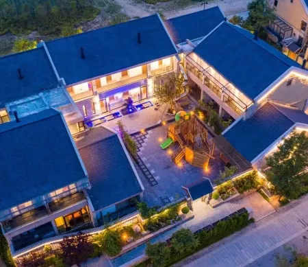 Floral Lux Hotel·tifu Hotel(Dongyi Town, wanpingkou, Rizhao) Отели рядом с достопримечательностью «Rizhao Navigational Engineering Vocational College»