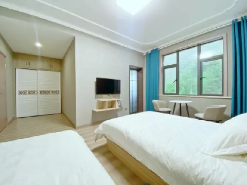 誼久民宿 鄰近高原飛瀑的酒店