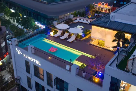 Xi Hotel (Changsha Wuyi Square IFC) Отели рядом с достопримечательностью «Nvzi University Library»