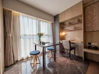 Wutong Apartments Hotel