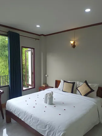 Vang Vieng Champa Hotel Отели рядом с достопримечательностью «Tham Jang»