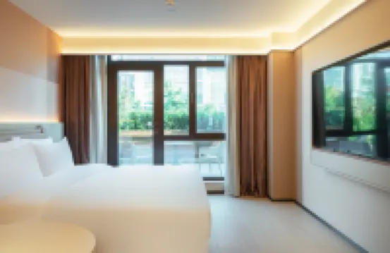 Orange Hotel (Weihai Railway Station Hanlefang)