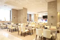 Vienna International Hotel (Xinxing new city square) - Morgenmad